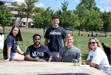 College students outside in Buchtel Commons